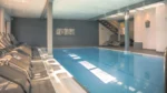 Piscine intérieure chauffée avec spa Hotel Spa et Restaurant Au Chasseur à Birkenwald